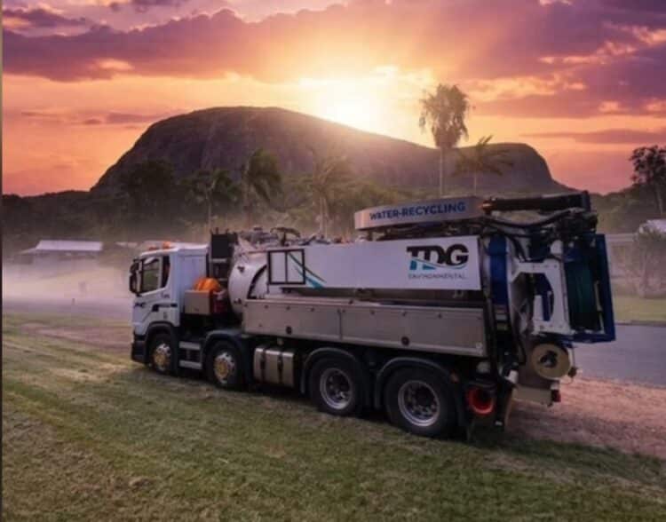 A vacuum excavation truck operated by TDG Environmental in Auckland.